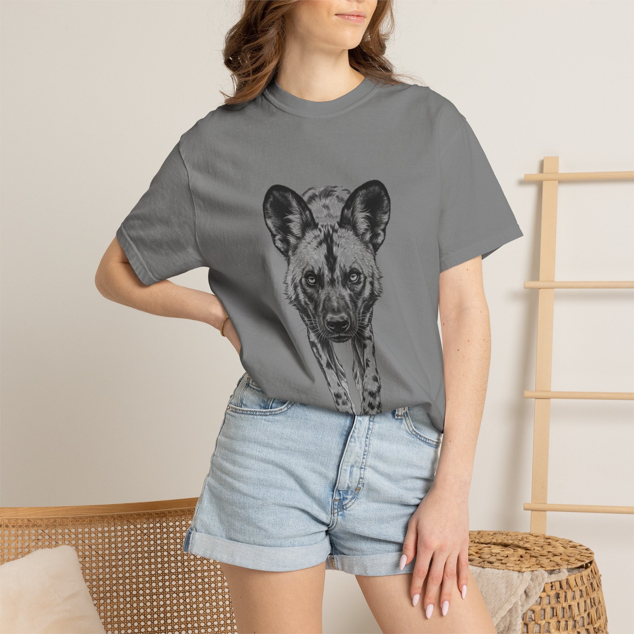 African Wild Dog Graphic T-Shirt — Realistic Walking Pawprint Design